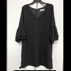Black dress with sleeve flair!